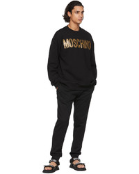 Sweat-shirt imprimé noir et doré Moschino