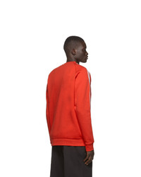 Sweat-shirt imprimé orange adidas Originals