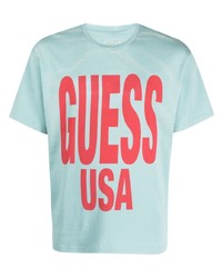 T-shirt à col rond imprimé bleu clair GUESS USA