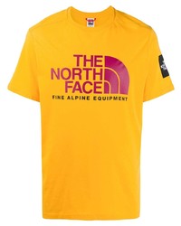 T-shirt à col rond imprimé moutarde The North Face