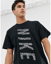 T-shirt à col rond imprimé noir Nike Running