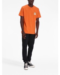 T-shirt à col rond imprimé orange Moschino