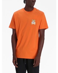 T-shirt à col rond imprimé orange Moschino