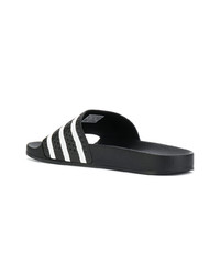 Tongs noires adidas